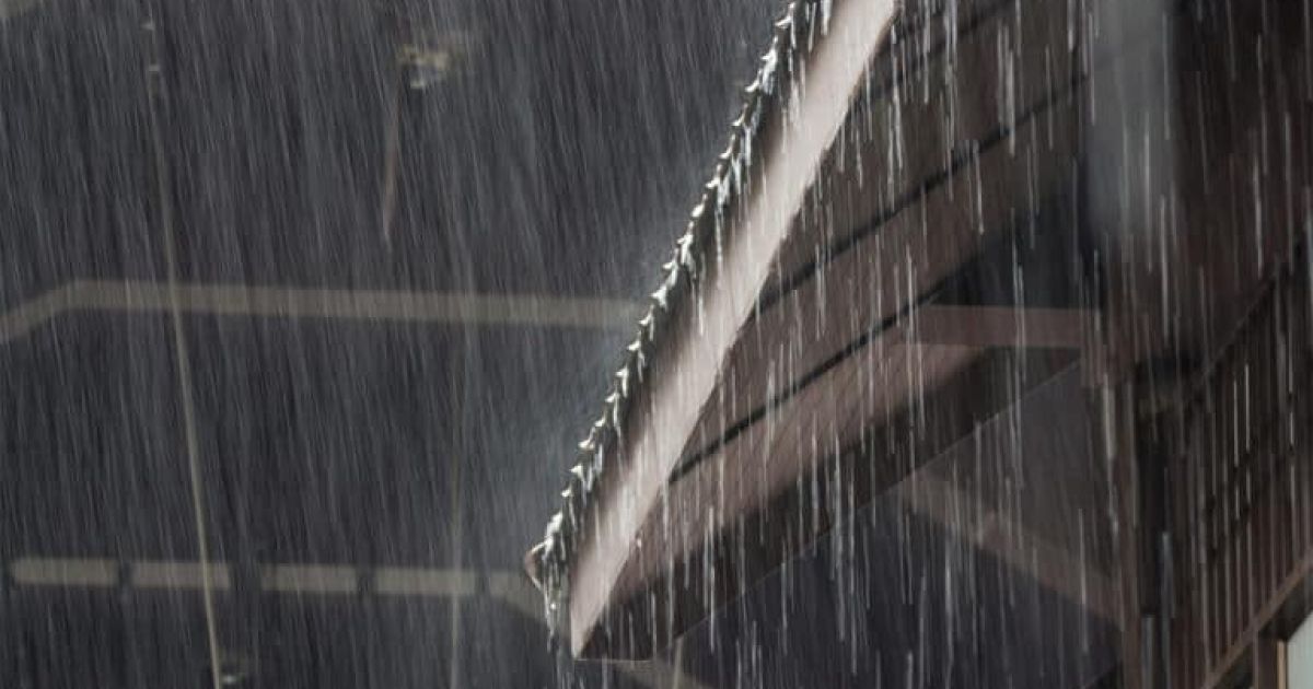 heavy rain Photo By Ratchat at Shutterstock
