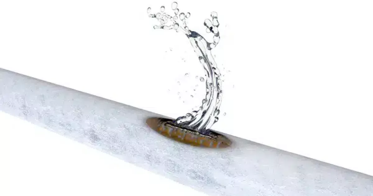 burst water pipe stock photo By posteriori at Shutterstock