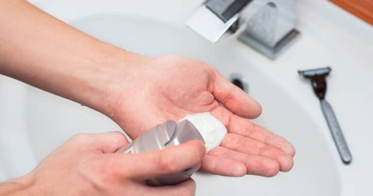 using soap under faucet Photo By Alena TS at Shutterstock
